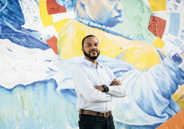 D’Artagnan Scorza in front of mural