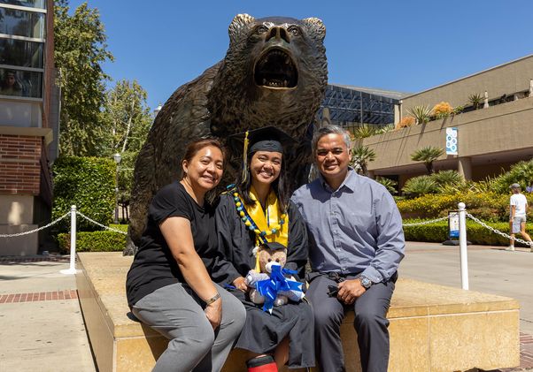UCLA Commencement 2021 - Family at the Bruin statue