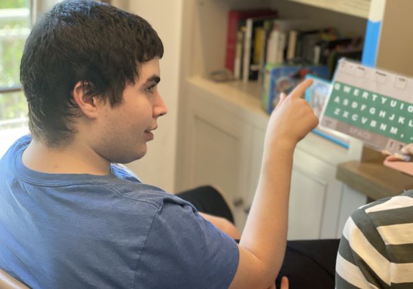 Woody Brown with letter board 
