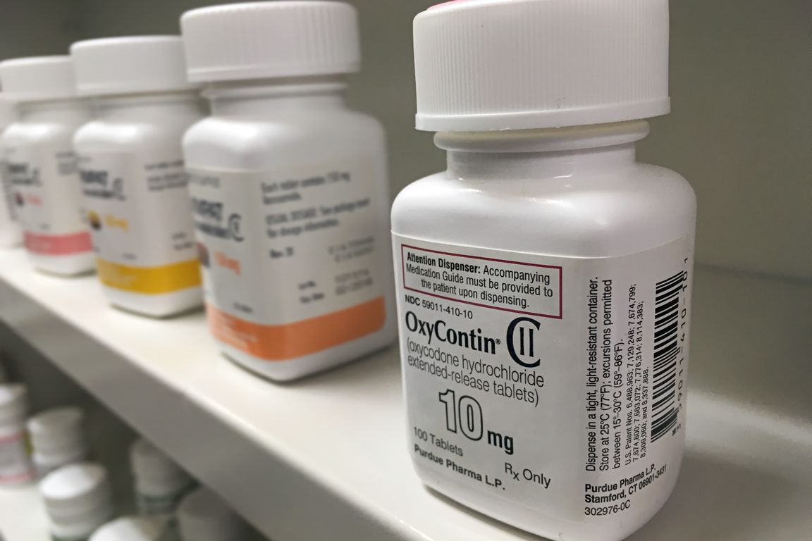 Bottle of OxyContin, a popular opioid, on a shelf