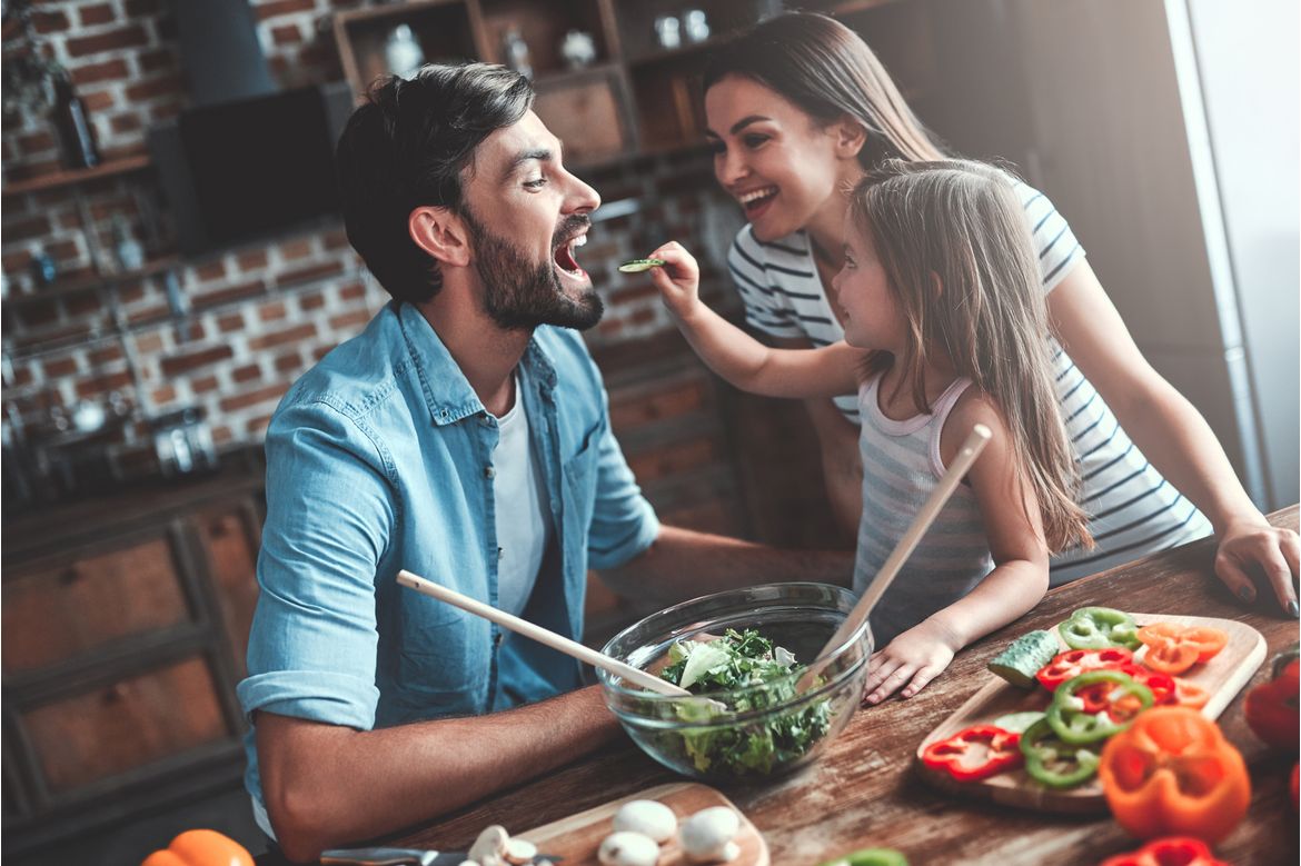 Family making salad