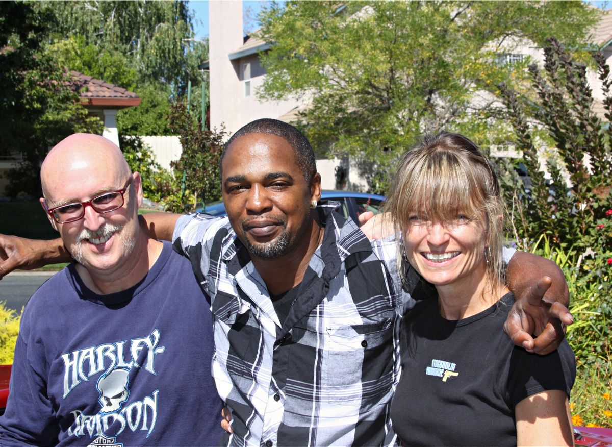 Maurice Caldwell with Chris Buckley and Buckley’s wife, JoAnn