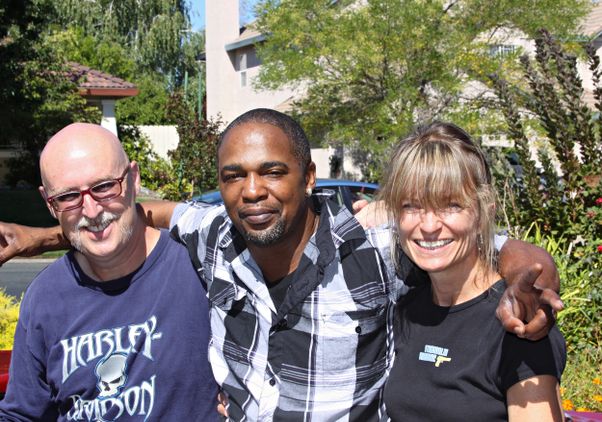 Maurice Caldwell with Chris Buckley and Buckley’s wife, JoAnn