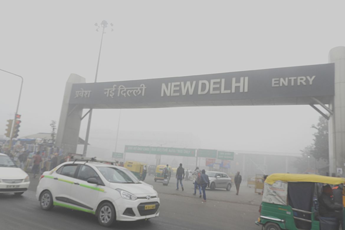 Thick pollution outside a New Delhi railway station