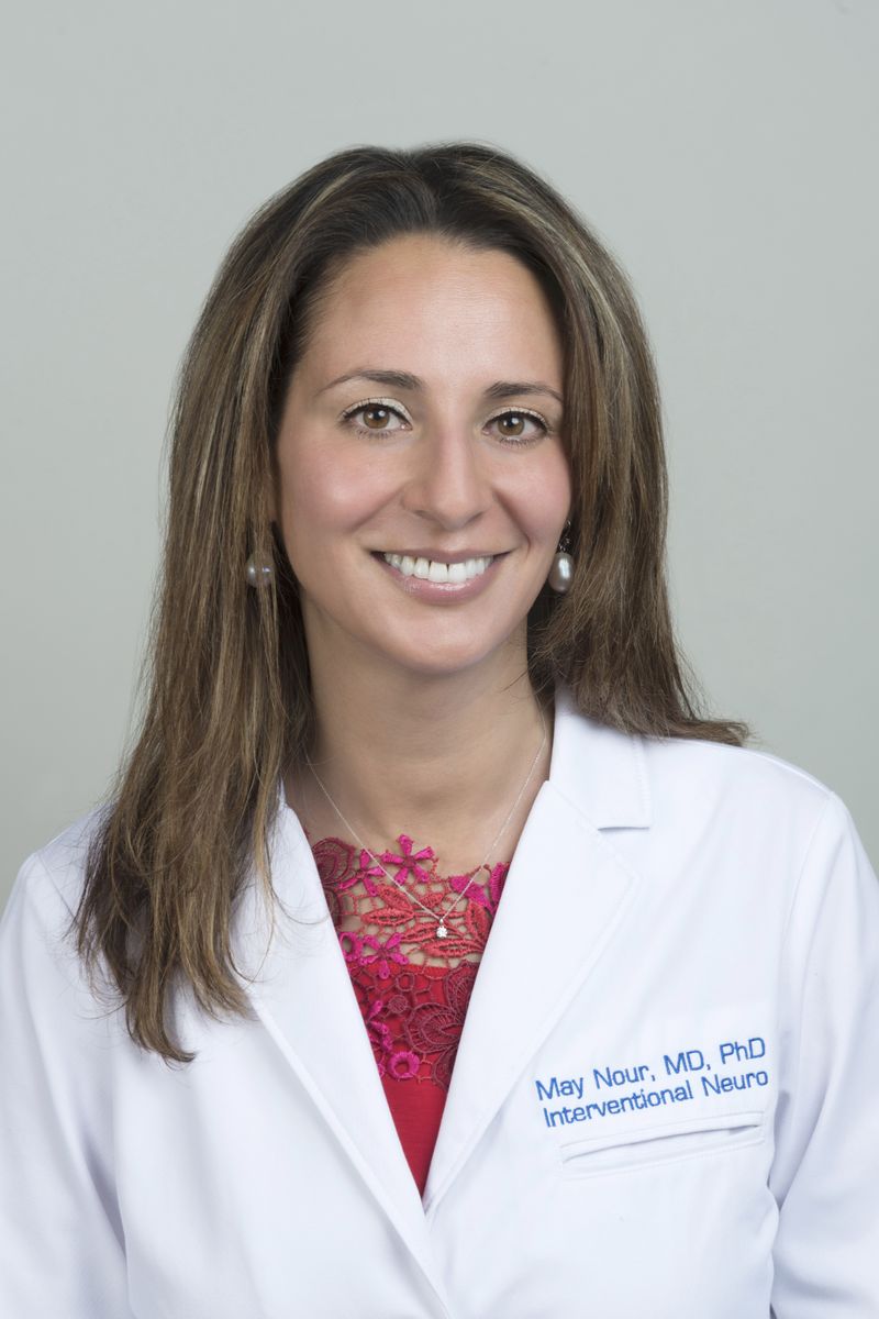 Dr. May Nour
