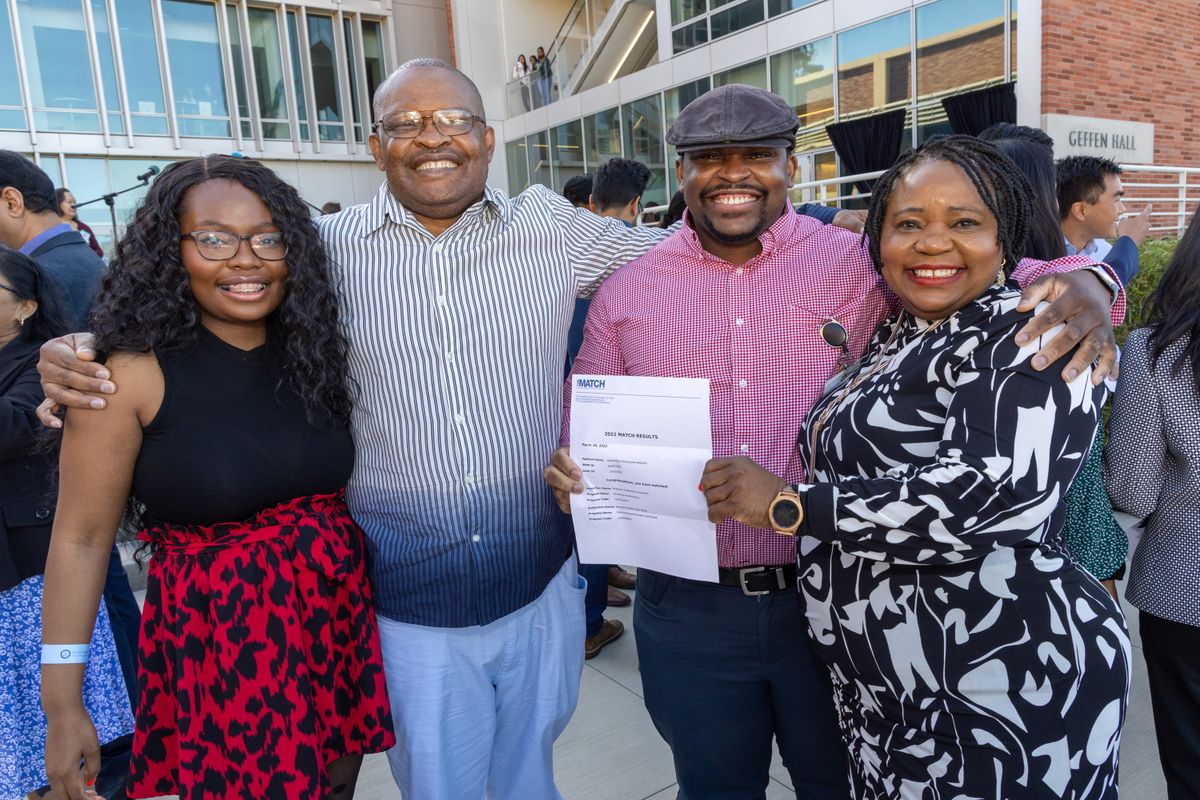 Adewunmi Olumuyiwa Adelaja and family on Match Day