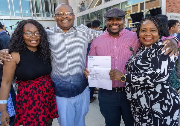 Adewunmi Olumuyiwa Adelaja and family on Match Day