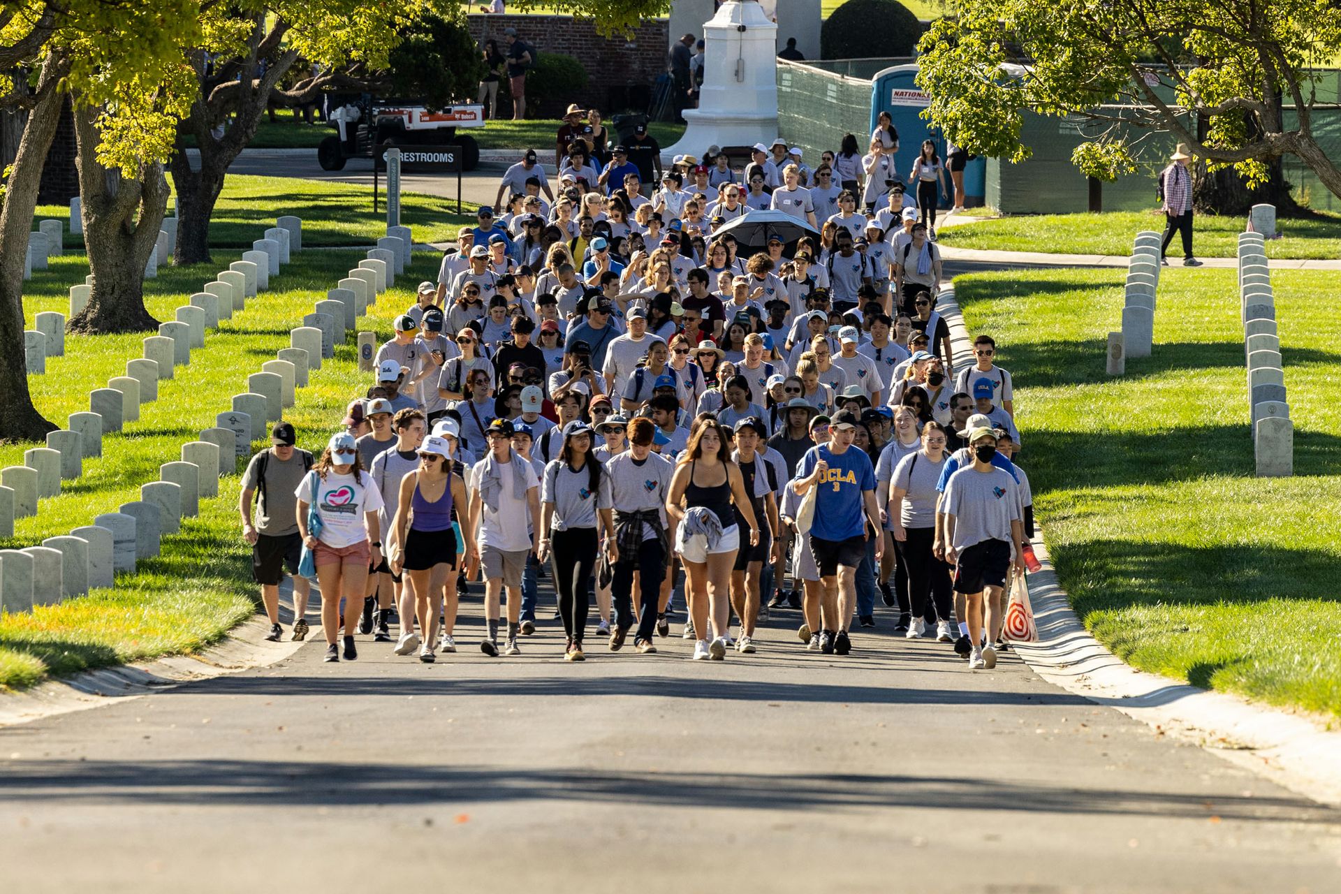 Students filing into veterans cemetery
