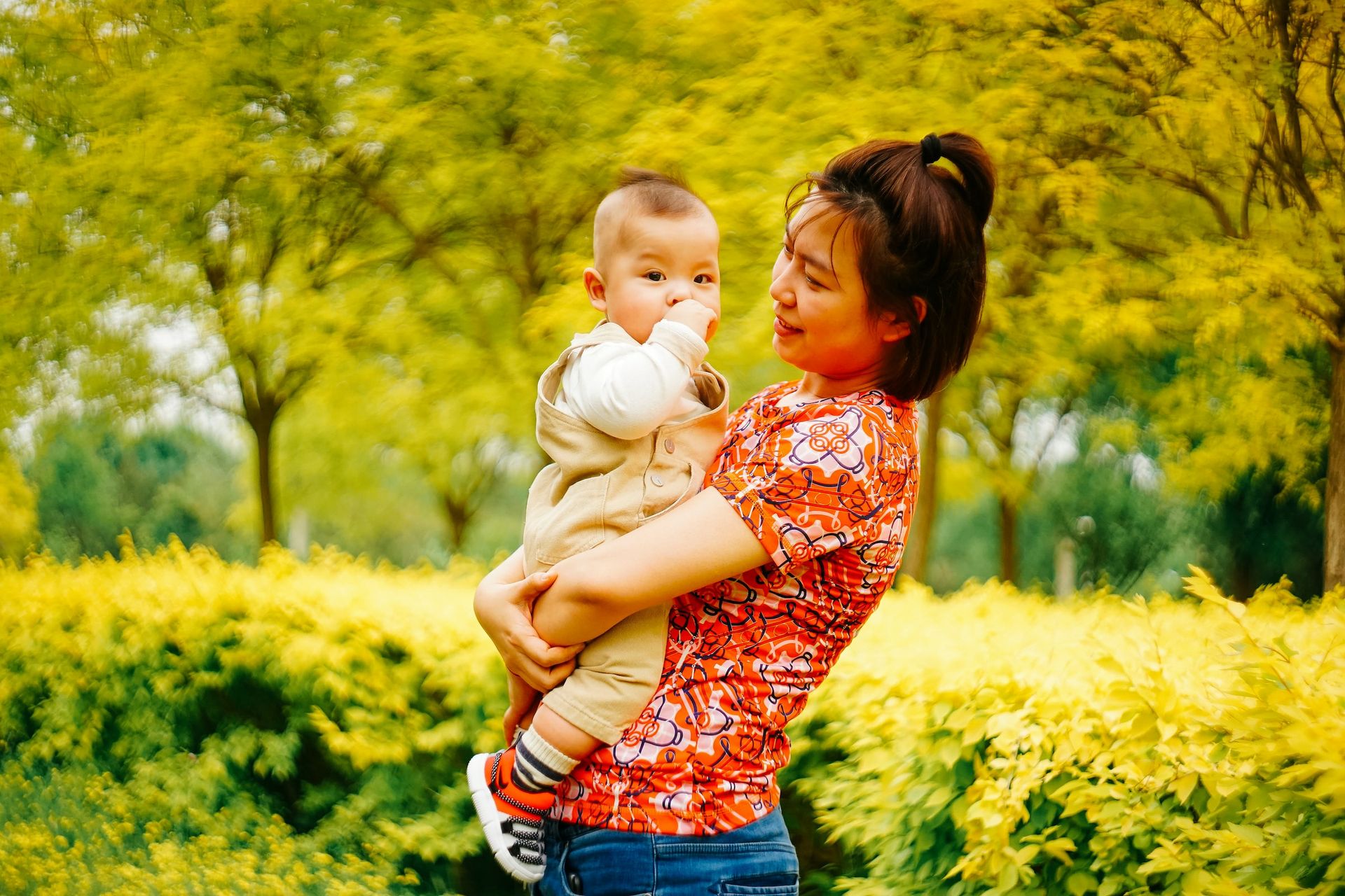 woman holding baby