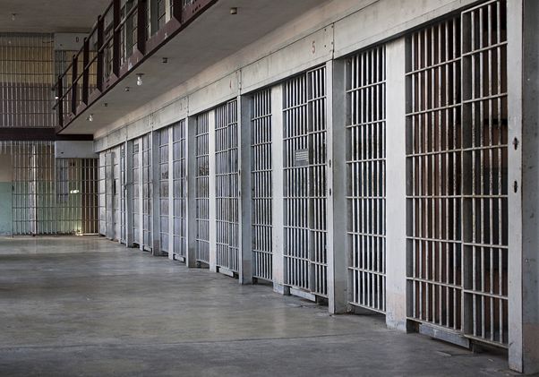 A row of empty prison cells