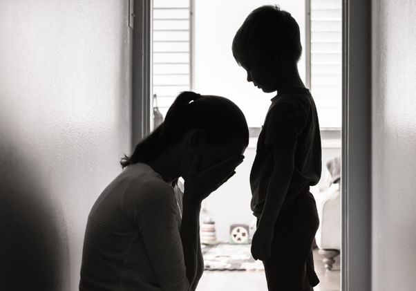 Mother and child in corridor