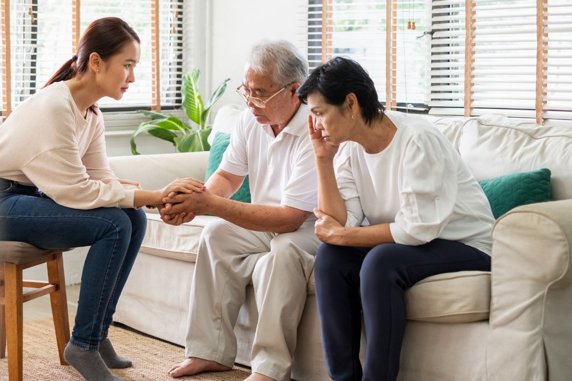 Asian family seated