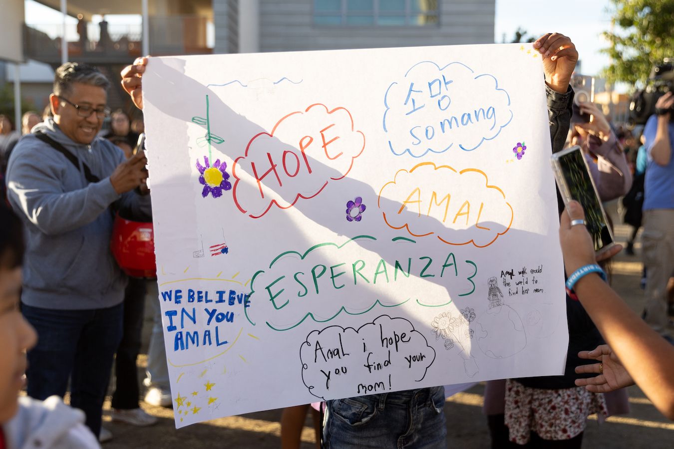Close-up of sign featuring the word ‘hope’ in different languages