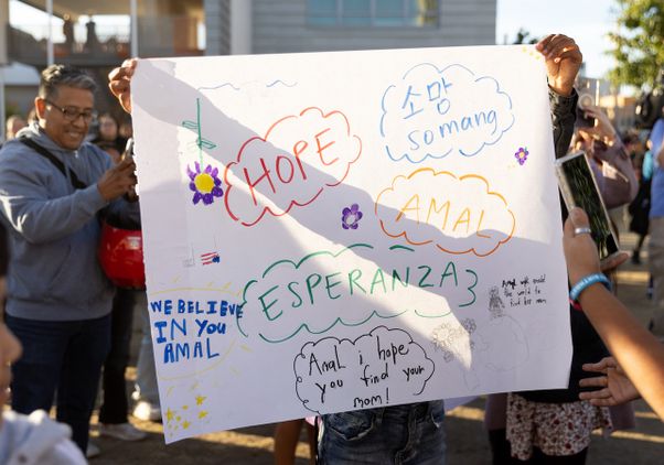 Close-up of sign featuring the word ‘hope’ in different languages