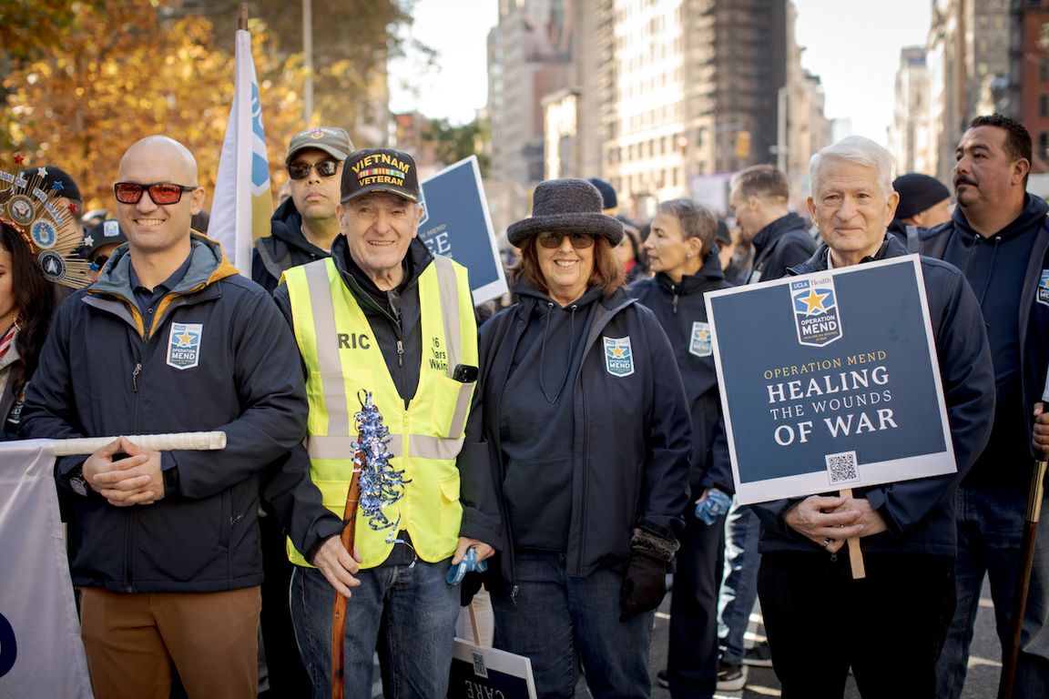 Chancellor Block stands with three others at New York City Veterans Day parade 