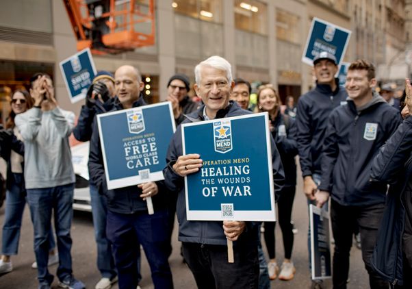 Chancellor Block and others walk with Operation Mend contingent at the New York City Veterans Day parade