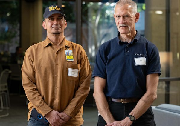 Two UCLA staff member veterans at UCLA luncheon honoring military service members