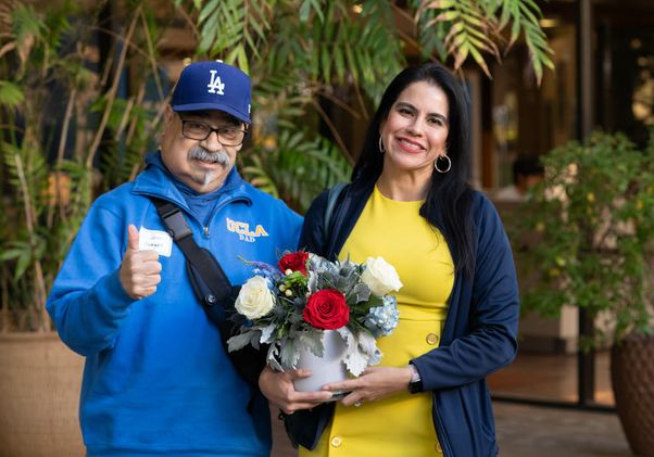 Alumna and her father at campus Veterans Day luncheon