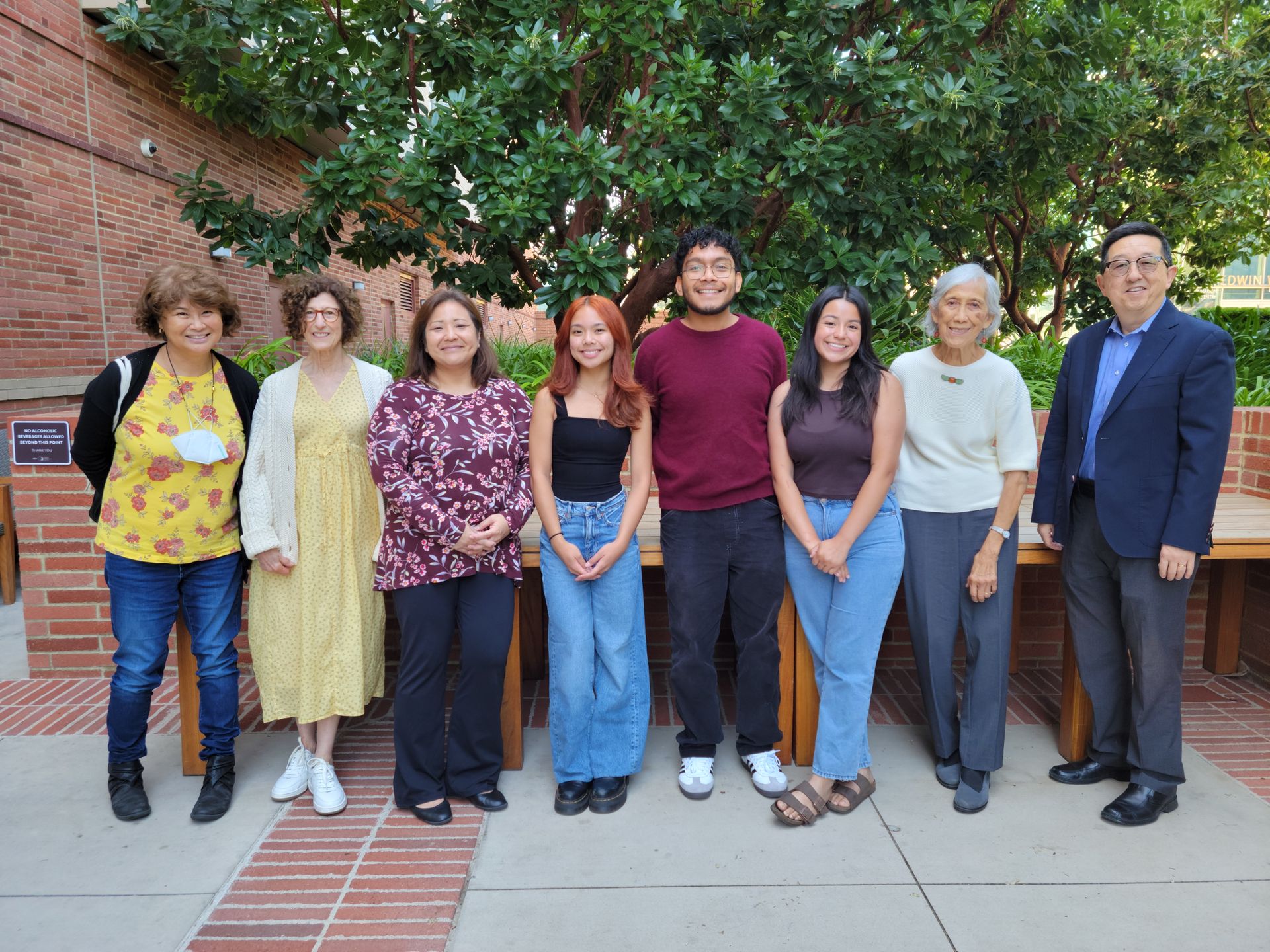 Group shot, from left to right: Candice Yokomizo, Jackie Greenberg, Carol Fujino, Jessa Bayudan, Omar Mondragon, Linsey Rodriguez, Karolynne Gee and David Yoo.