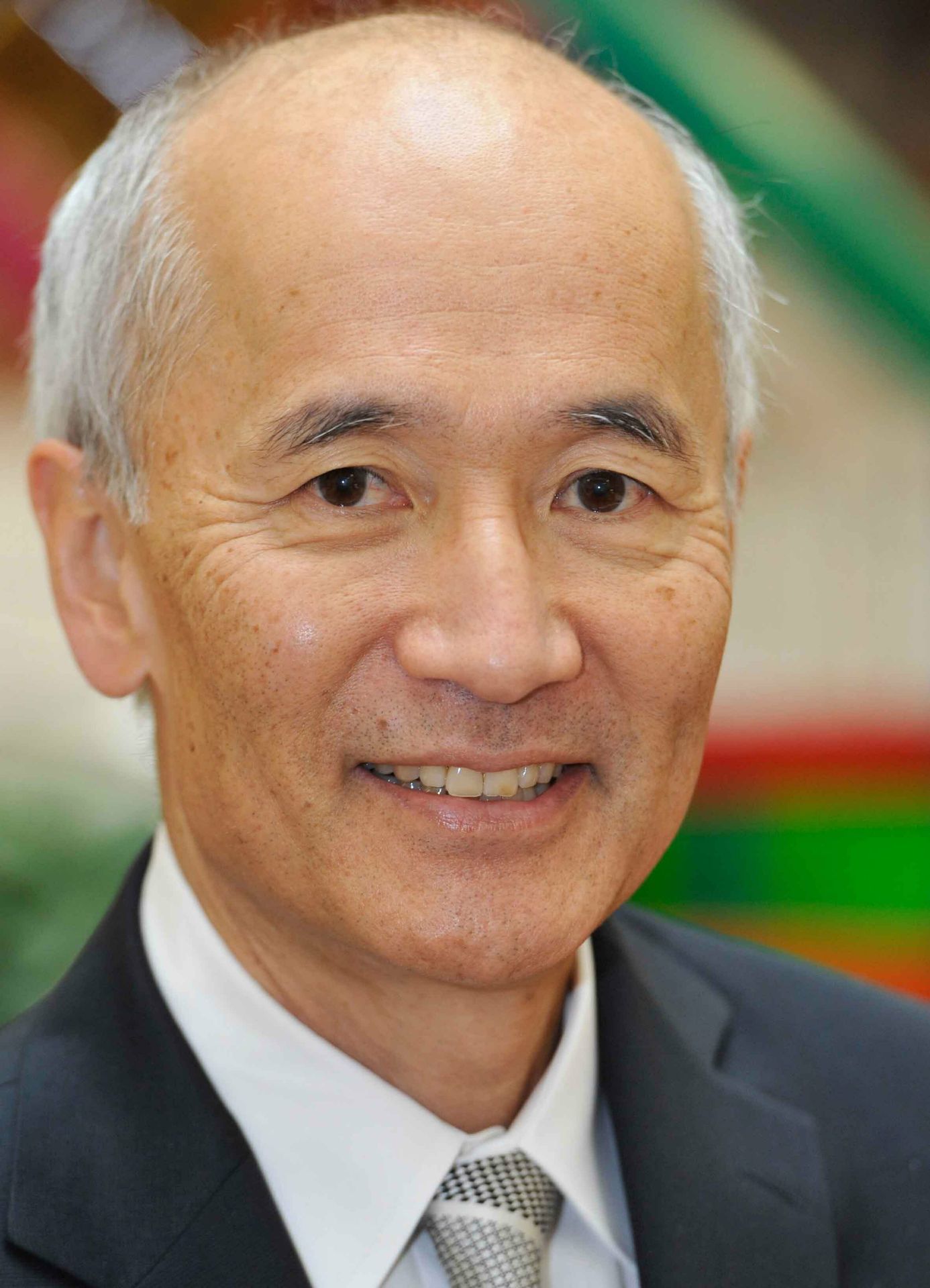 Close-up portrait of Roger Wakimoto