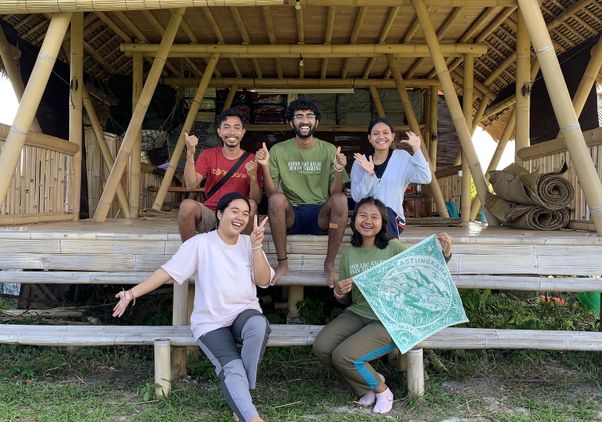 Karjagi (center) and a happy crew
