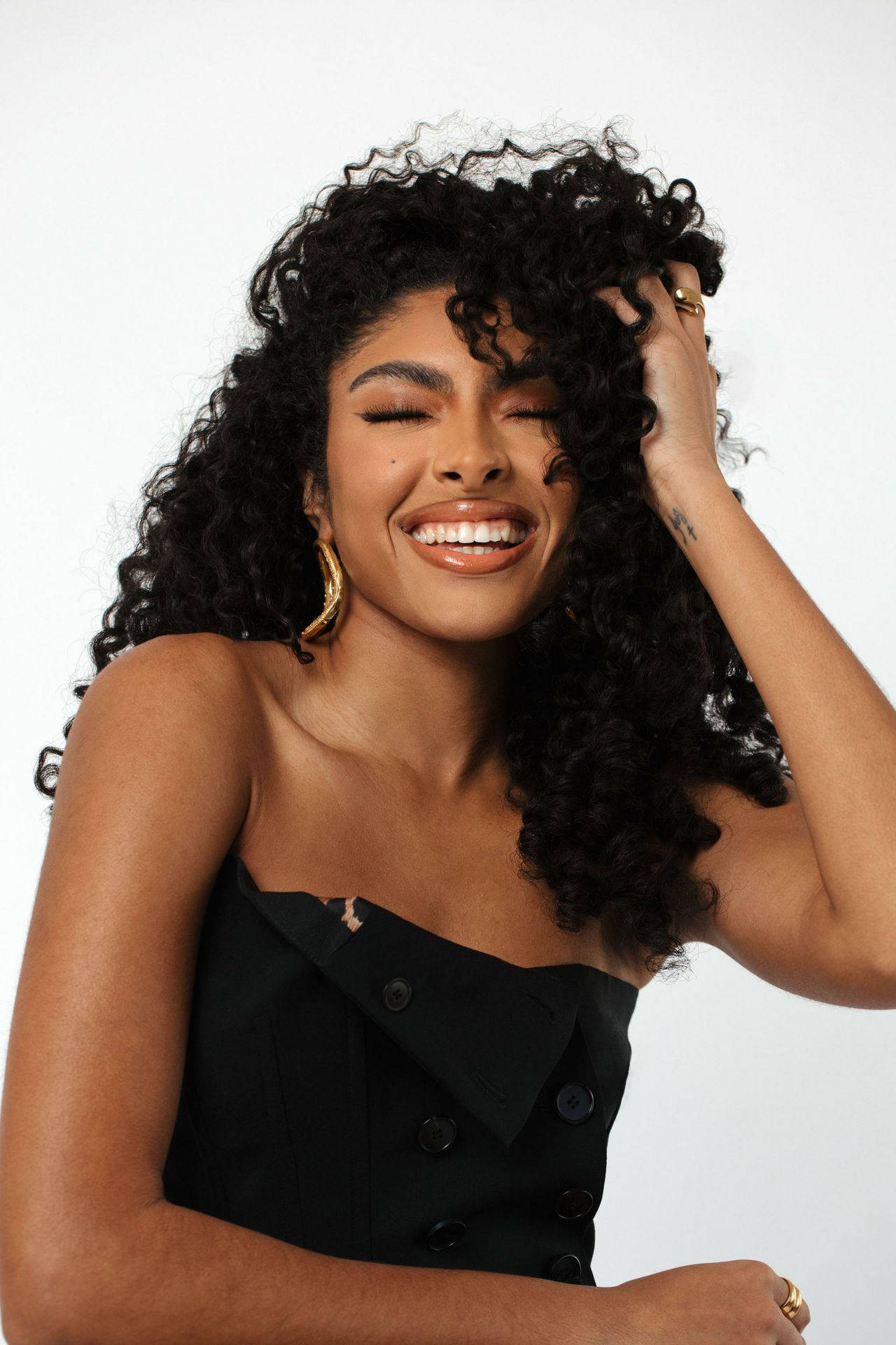 Head-and-shoulders shot of Ivy Coco Maurice smiling.