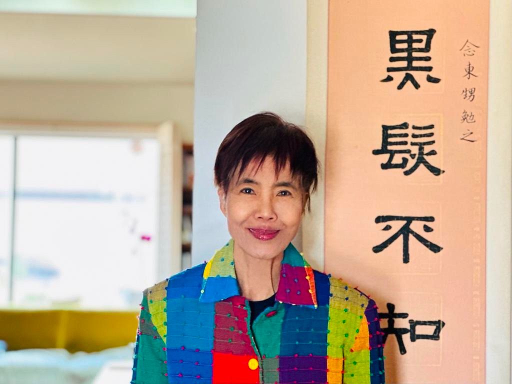 King-Kok Cheung wearing a colorful top
