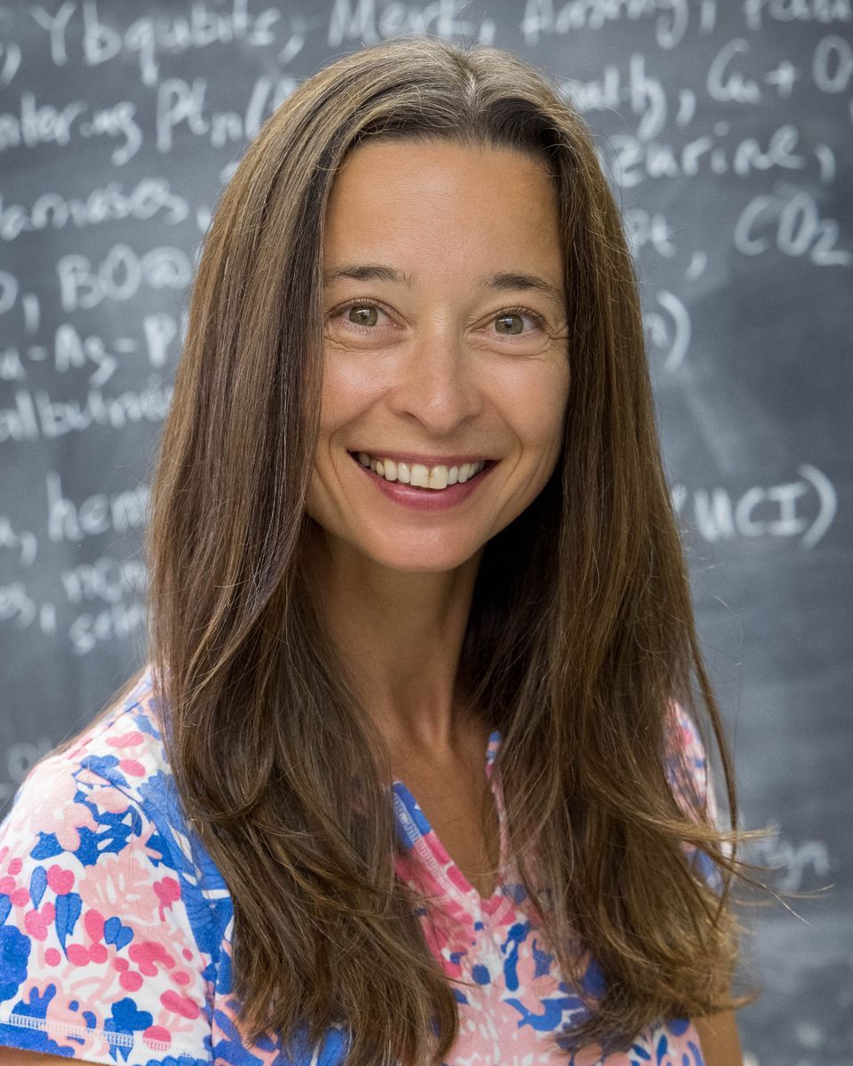 Anastassia Alexandrova in front of chalkboard