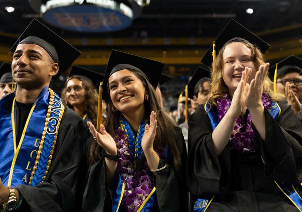 Members of class of 2023 applauding at UCLA College commencement 
