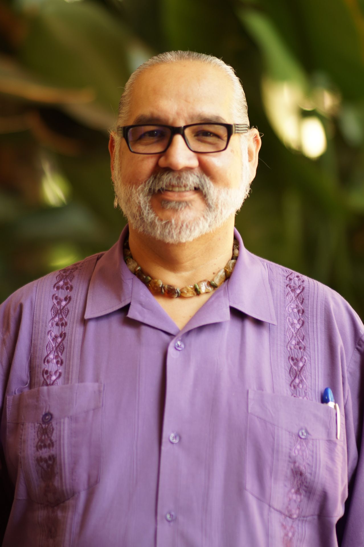 Photo Alfred Herrera in purple shirt UCLA