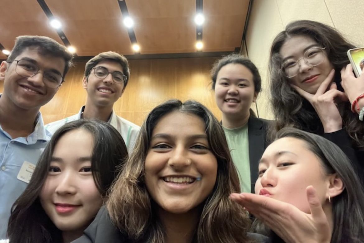 MedalUp team selfie, including seven team members