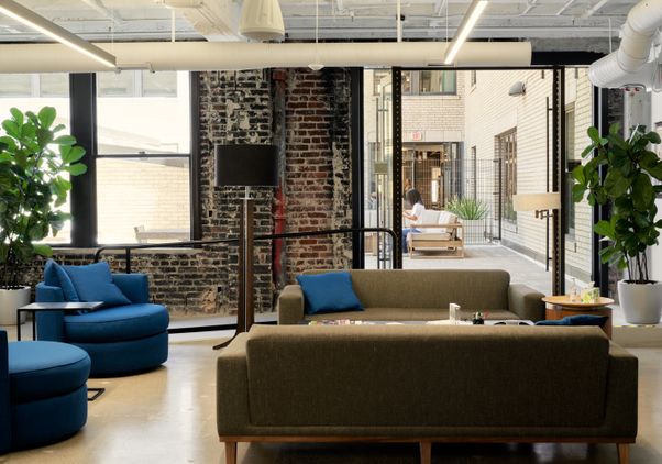 A  room inside the Trust Building that looks out on a patio