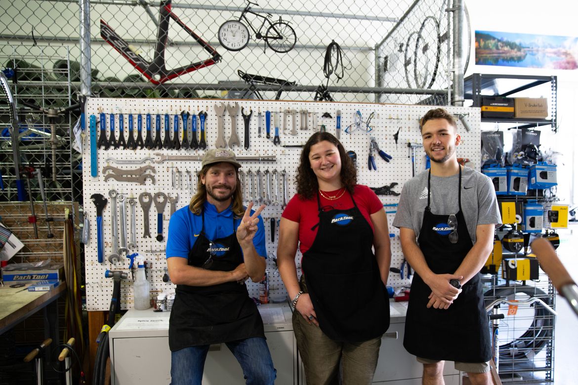 Nate Woiwode with student staff members Elodie Hekimian-Brogan and Ben Wiersma