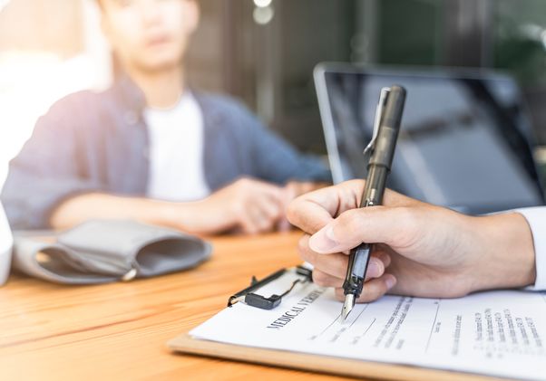 Filling out medical form 