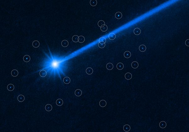 Dimorphos asteroid surrounded by boulders 