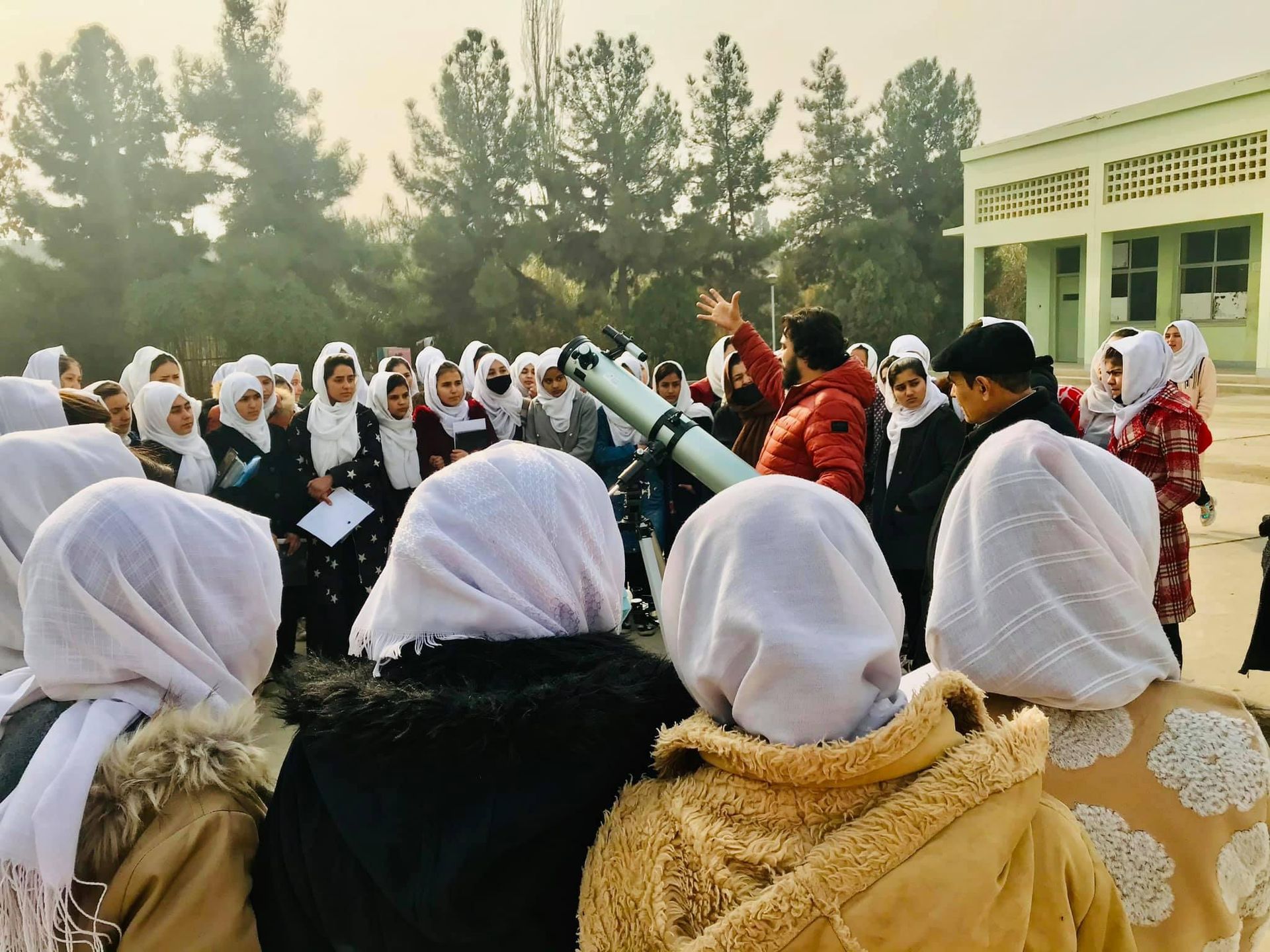 Abraham Amiri teaching young women in Afghanistan