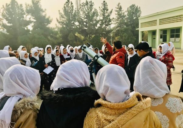 Abraham Amiri teaching young women in Afghanistan