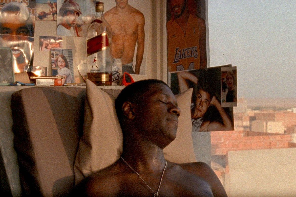 Man sleeping by a window from the film “Fort Buchanan”