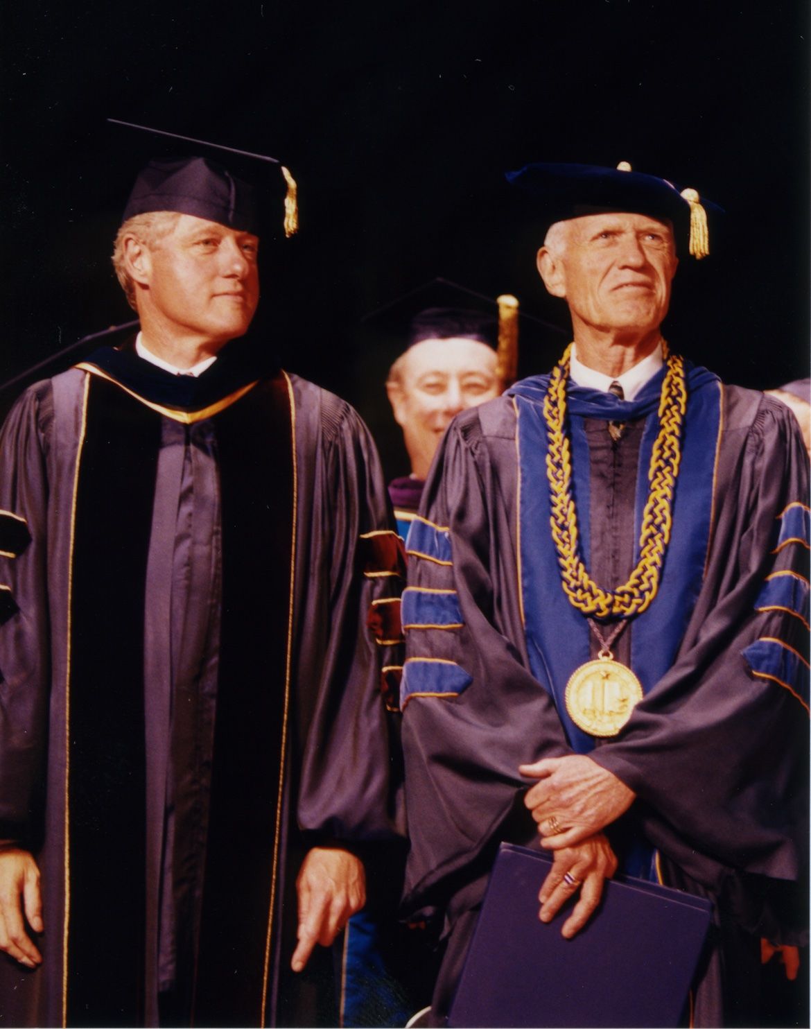 Bill Clinton and UCLA Chancellor Charles E. Young stand in academic regalia in 1994