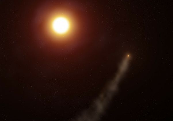 Illustration of planet with tail orbiting a star