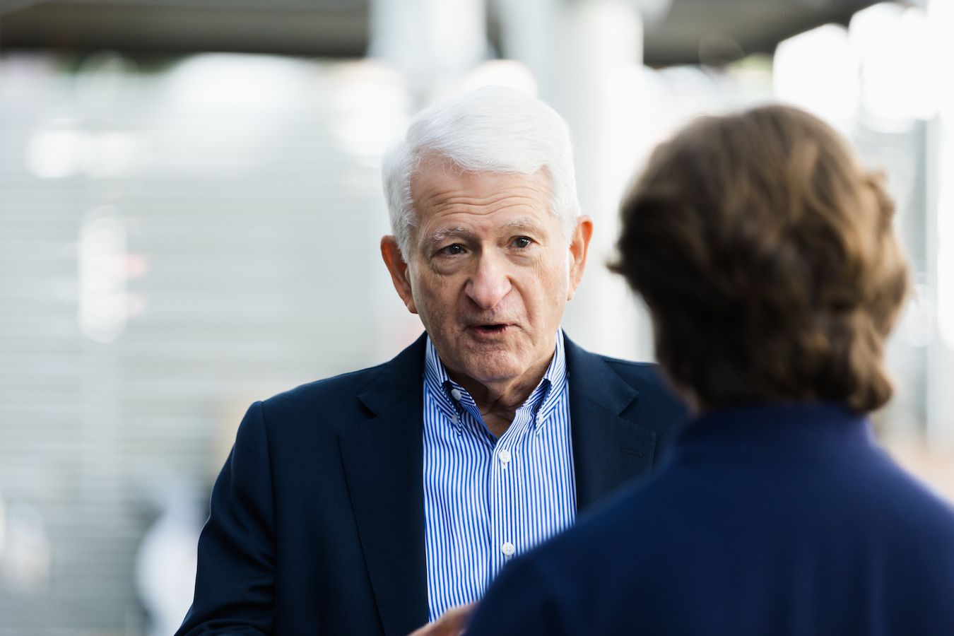 Chancellor speaking with student after event
