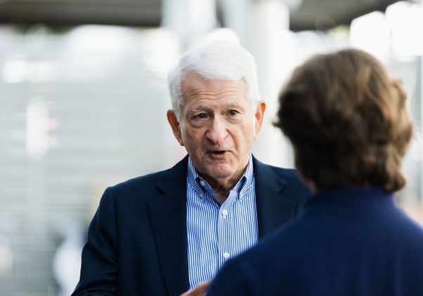 Chancellor speaking with student after event