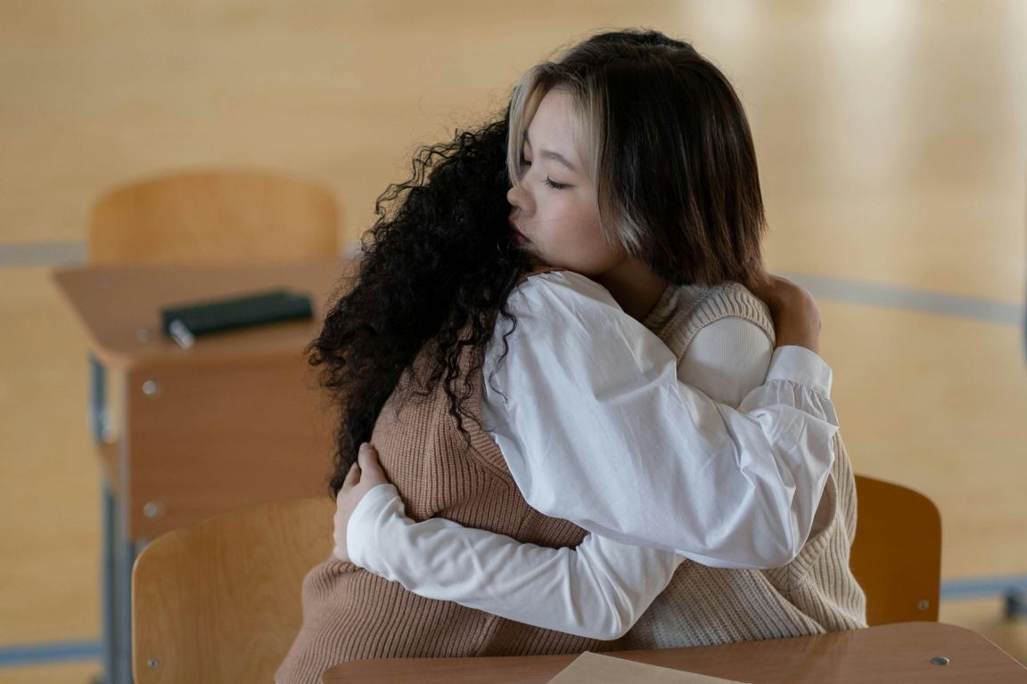 student hug