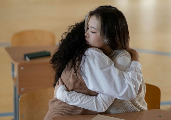 student hug
