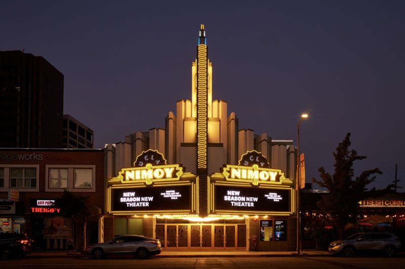 The Nimoy Theater marquee lit up at night