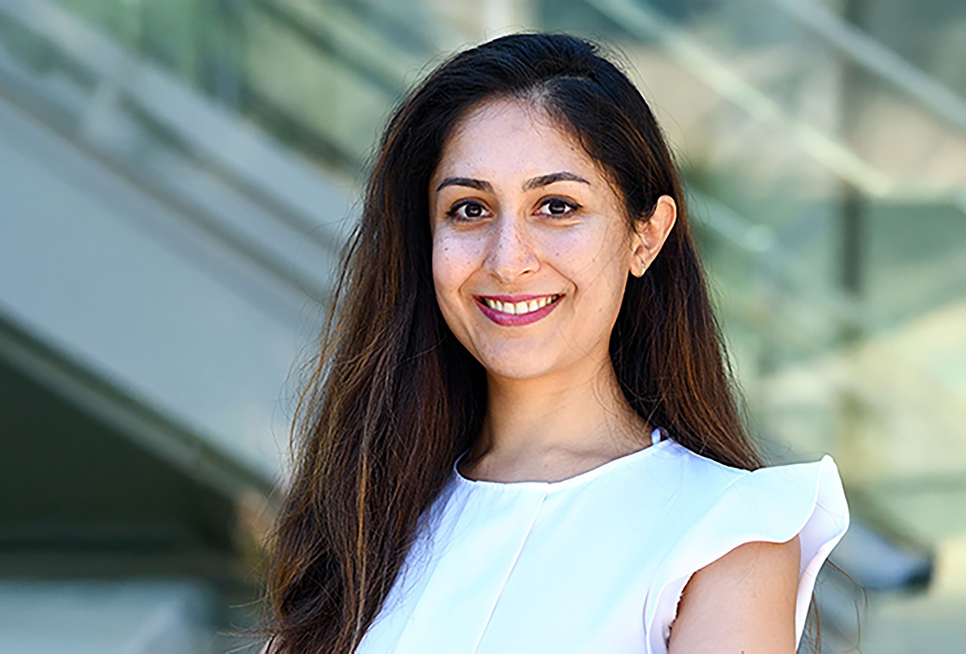 Head-and-shoulders photo of Baharan Mirzasoleiman in white top