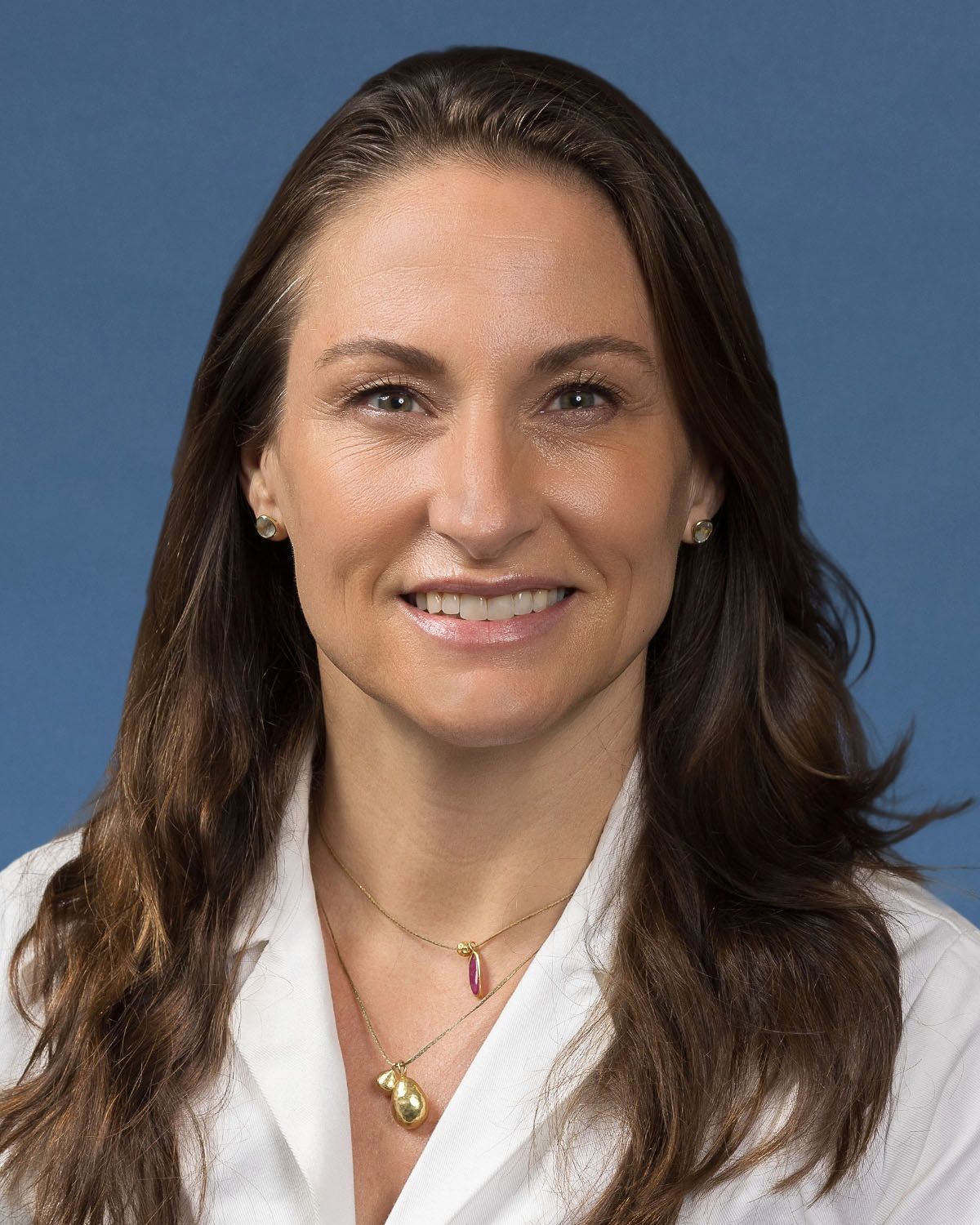 Head-and-shoulders photo of Catherine Juillard in white coat