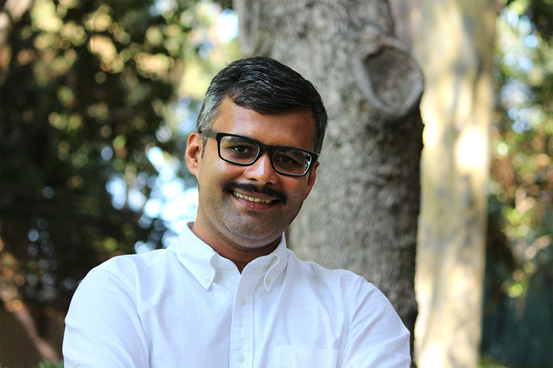 Tejas Parasher in a white shirt