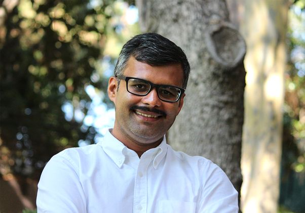 Tejas Parasher in a white shirt