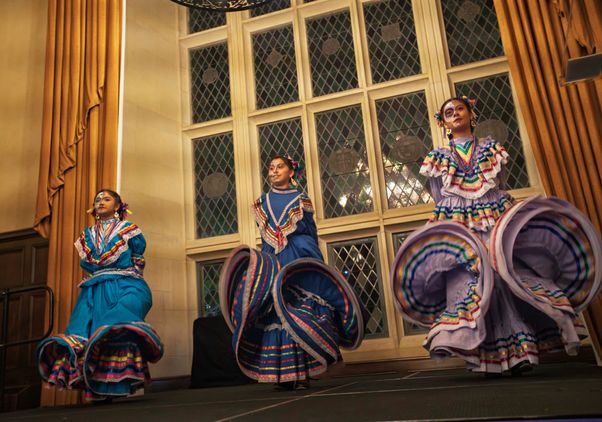 Ballet Folklorico Flores Migrantes dancing inside Kerckhoff Hall Grand Salon.  
